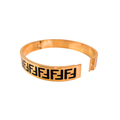Meliora Gouden Met Zwarte Letters Polsband - Gouden Afwerking