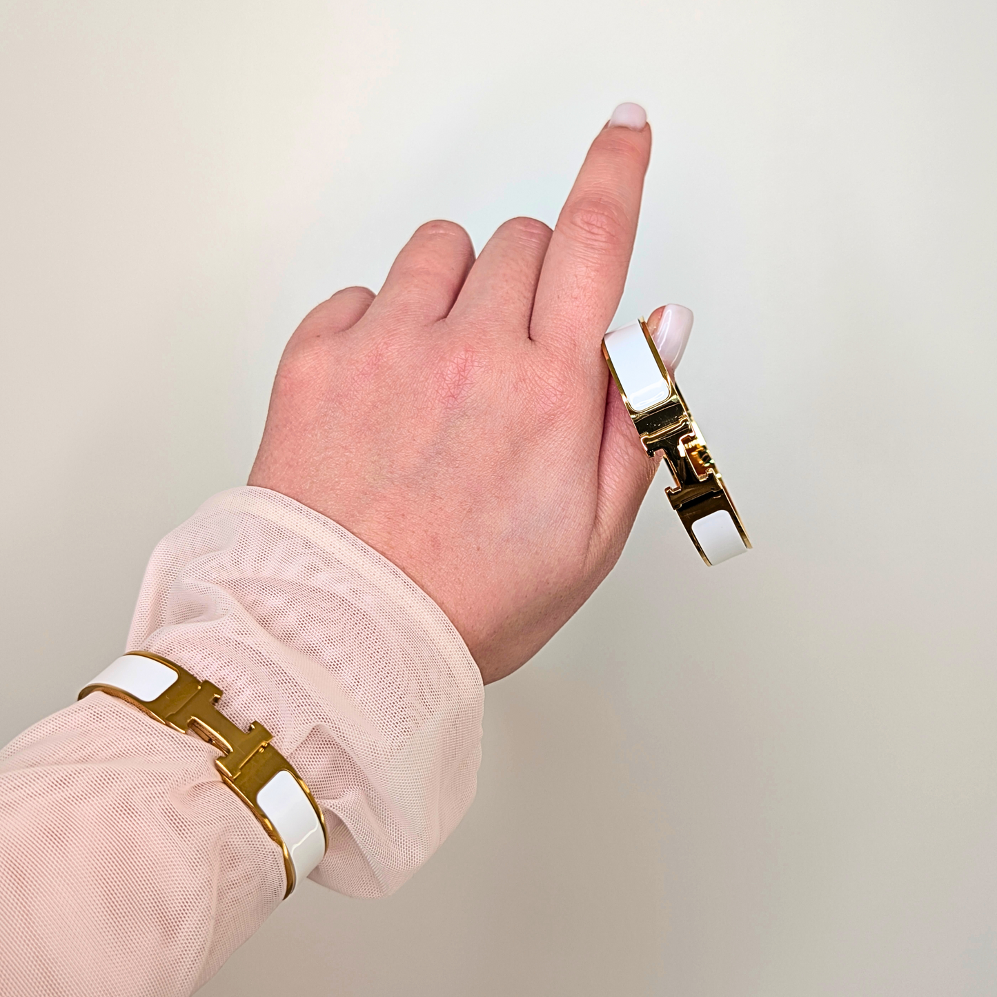 Calindra Witte Polsband - Gouden Afwerking